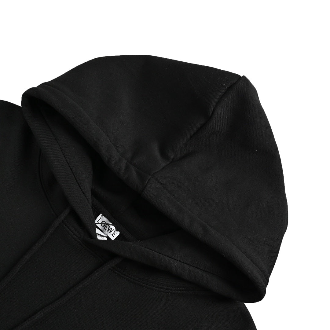 Hooded sweatshirt with embossed leather patch on chest