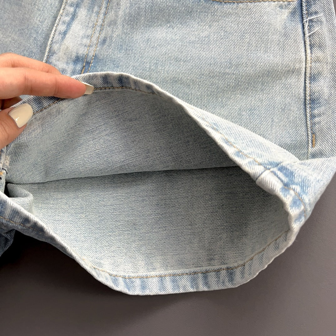 Denim shorts with cutout letters