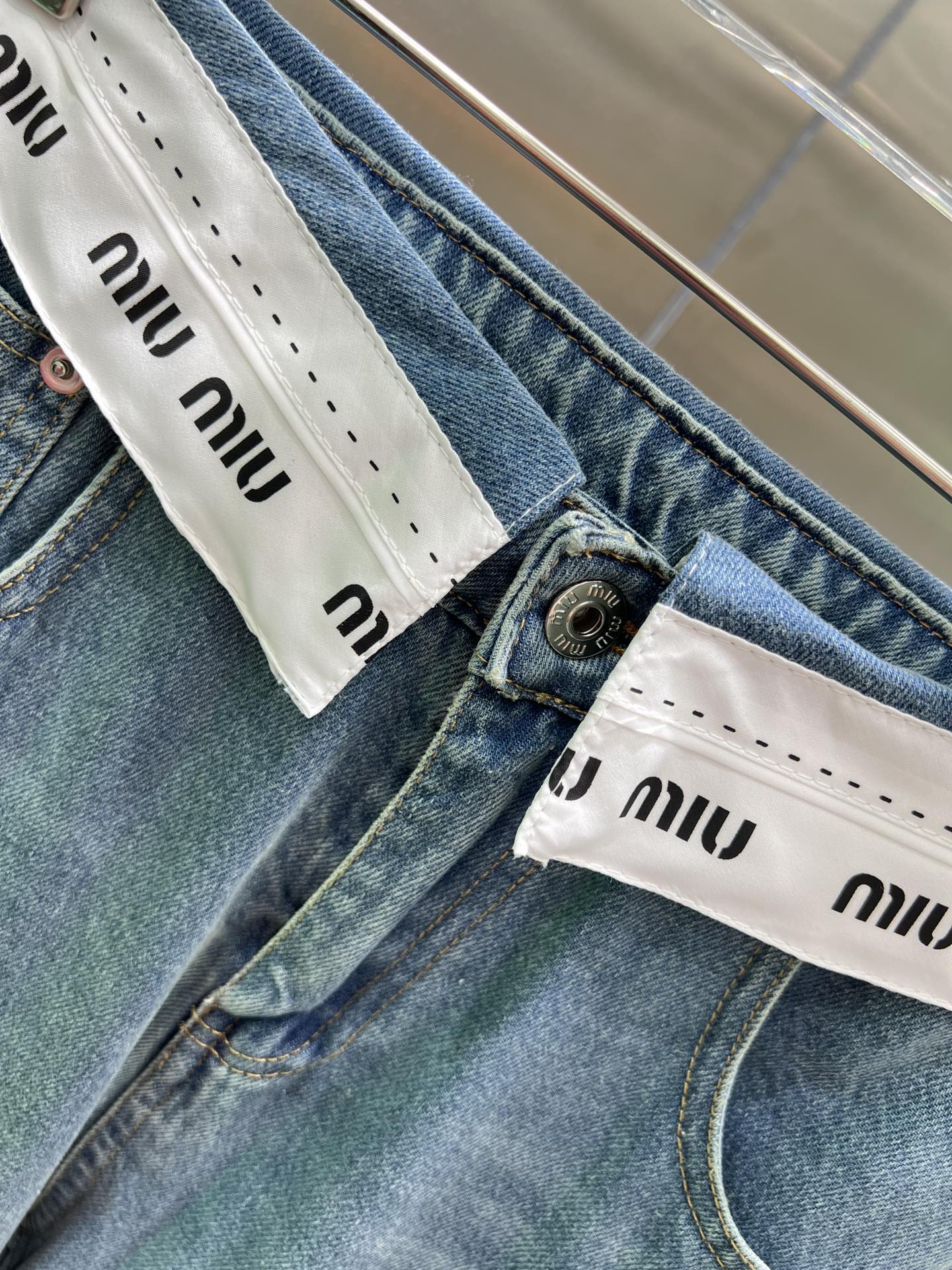 Jeans with logo on waist