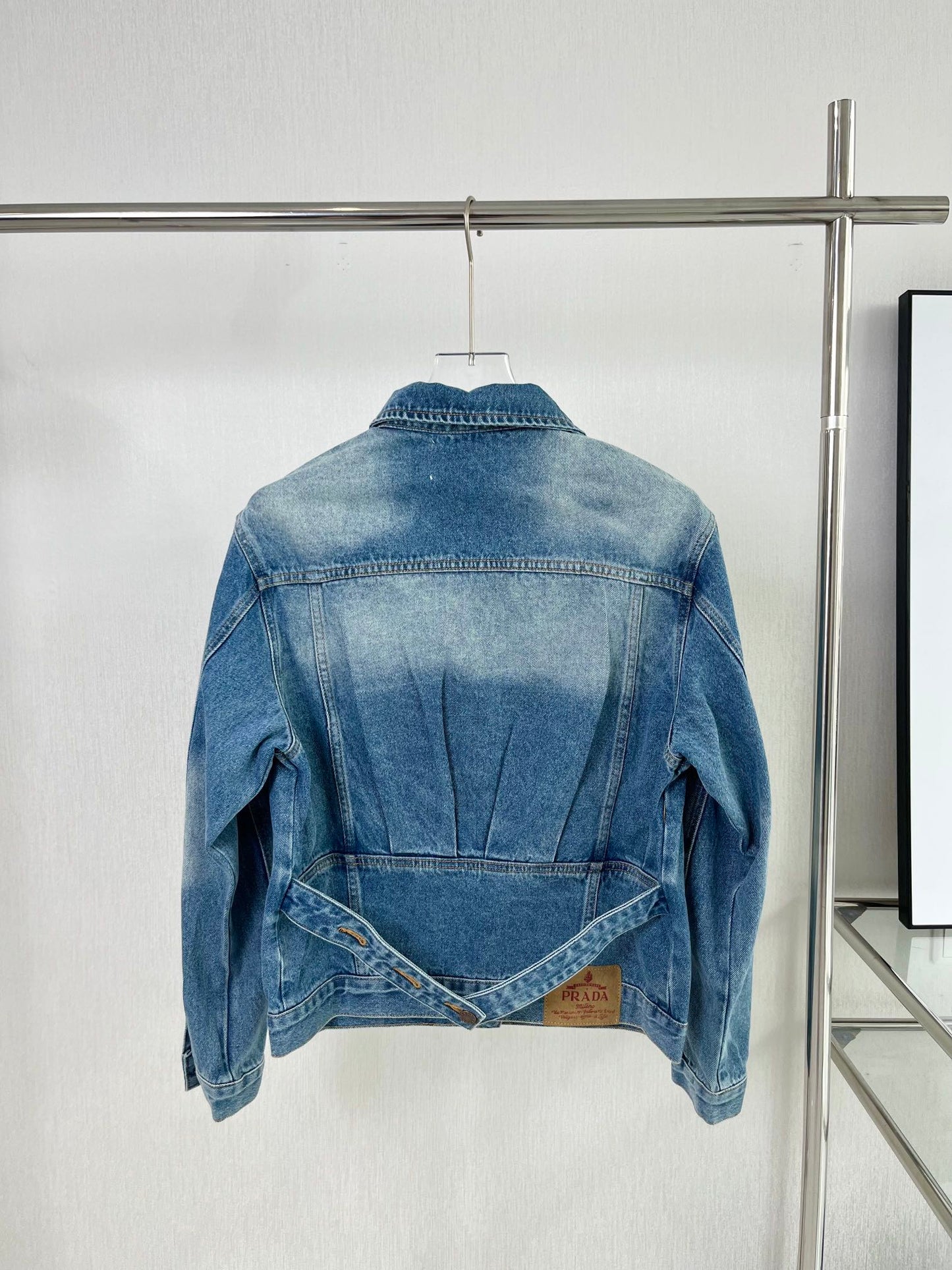 Logo embellished washed denim belted jacket