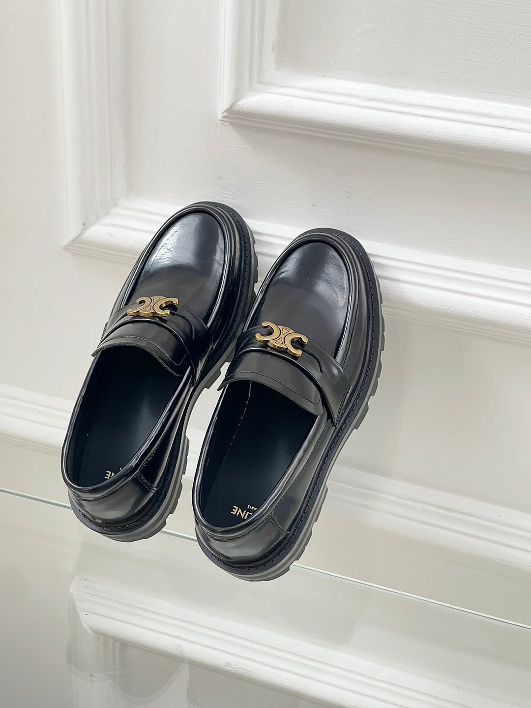 Thick-soled Arc de Triomphe loafers