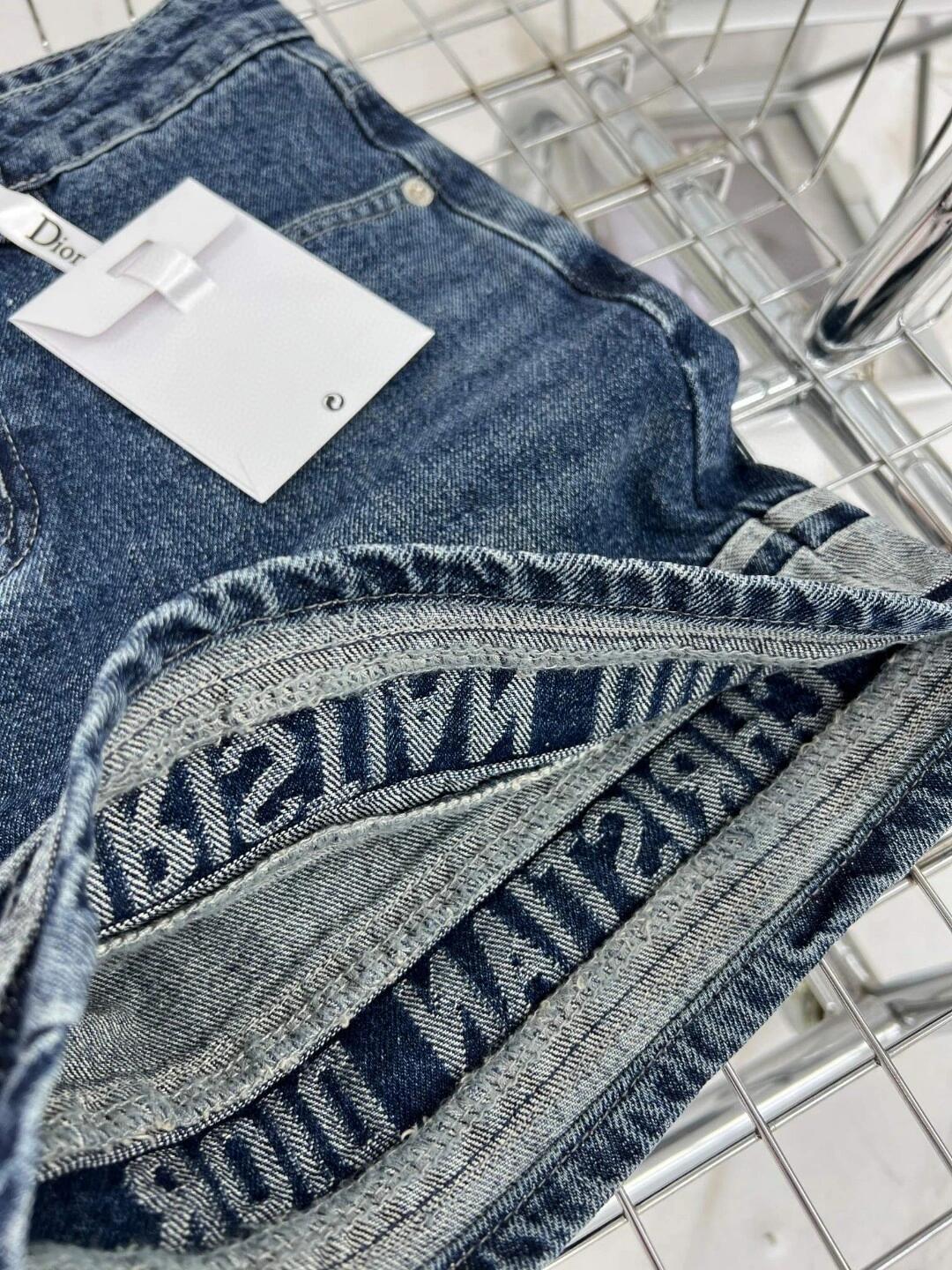 Denim shorts with logo on hem