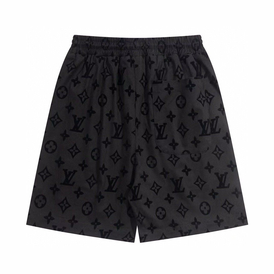 All-over printed dark logo pattern shorts