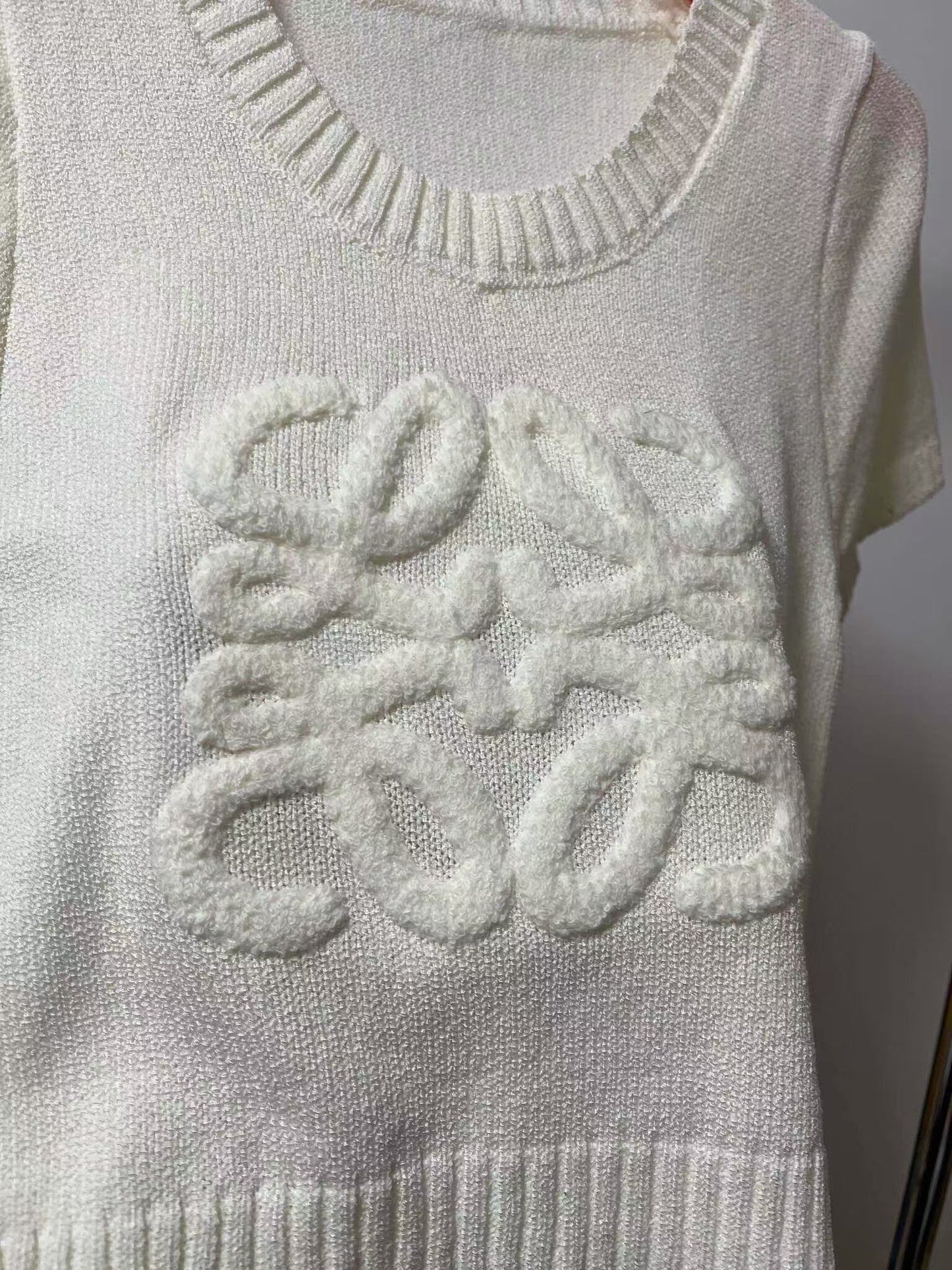 flocked logo sweater