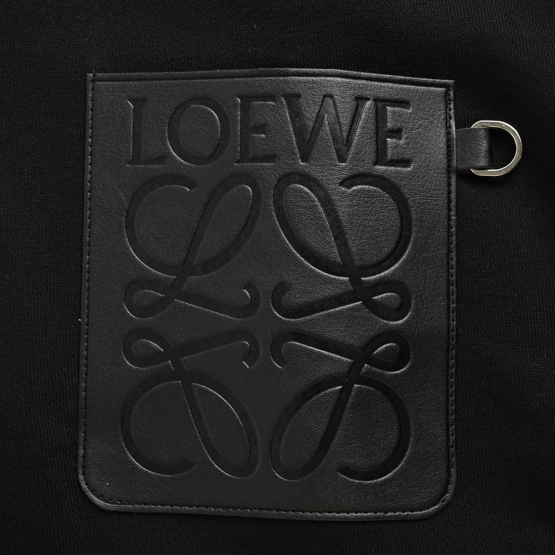 Hooded sweatshirt with embossed leather patch on chest